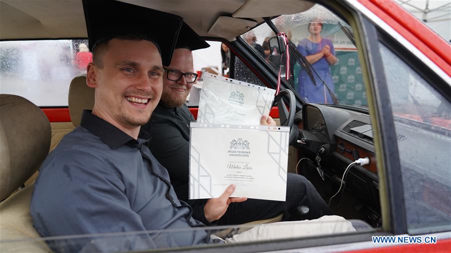 LATVIA-RIGA-DRIVE-IN GRADUATION CEREMONY