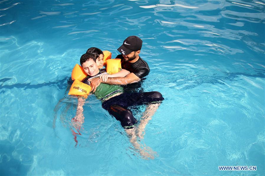 MIDEAST-GAZA-AUTISTIC CHILDREN-SWIMMING