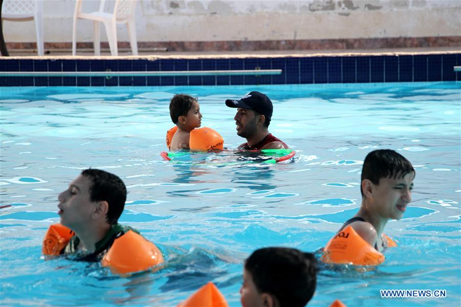 MIDEAST-GAZA-AUTISTIC CHILDREN-SWIMMING