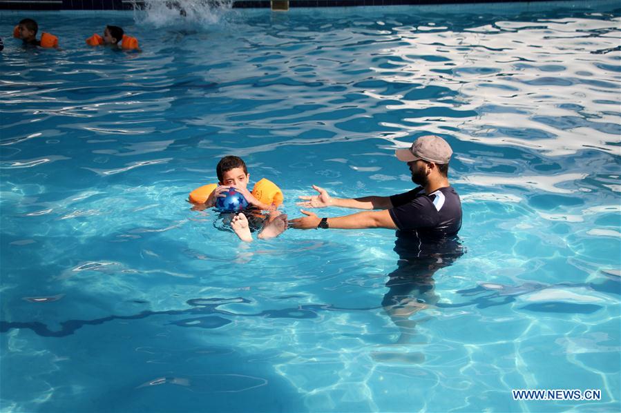 MIDEAST-GAZA-AUTISTIC CHILDREN-SWIMMING