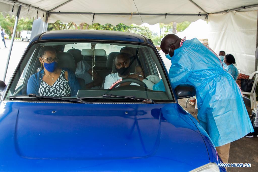 Health worker administers COVID-19 vaccine in Kigali, Rwanda