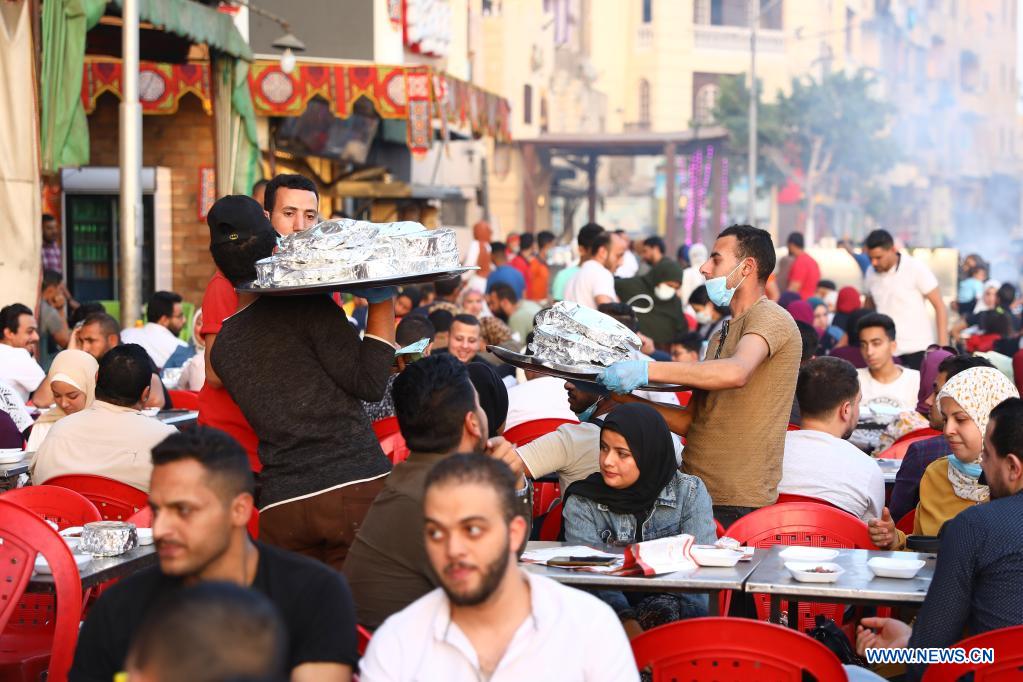 People have iftar during Ramadan in Cairo Egypt Xinhua