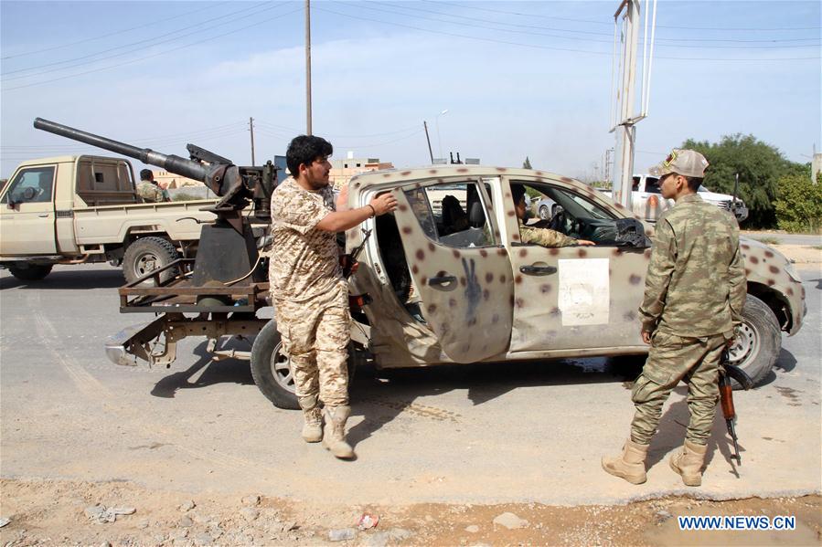 libyan gov"t forces attack east-based army, capture over 100