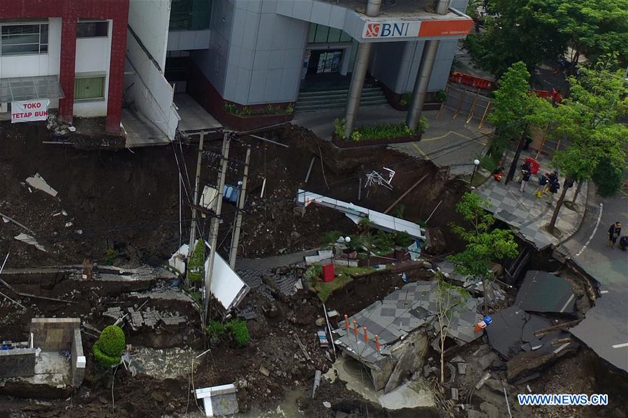 INDONESIA-SURABAYA-ROAD SINKHOLE