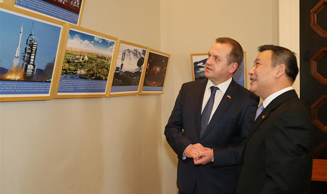 Lithuanian capital holds photo show on China's reform-and-opening-up drive