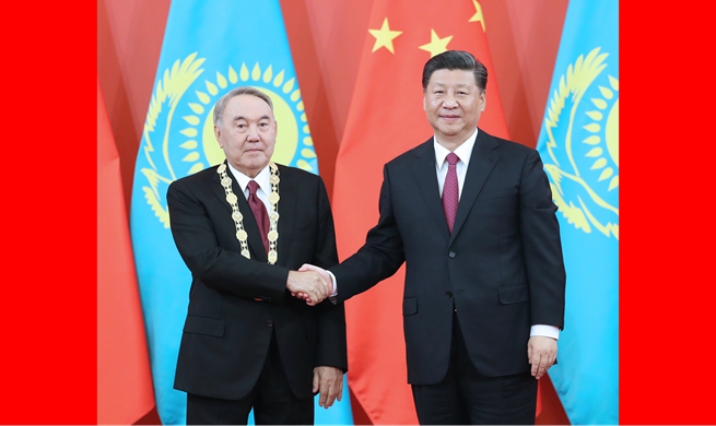 Xi meets first president of Kazakhstan