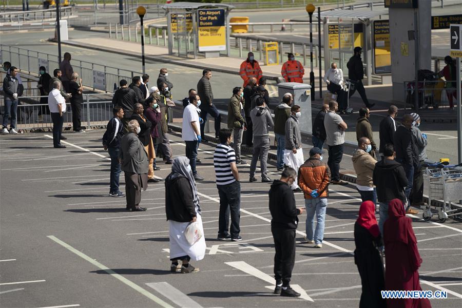 Travellers required to wear face masks and gloves at some airports in Britain Xinhua English