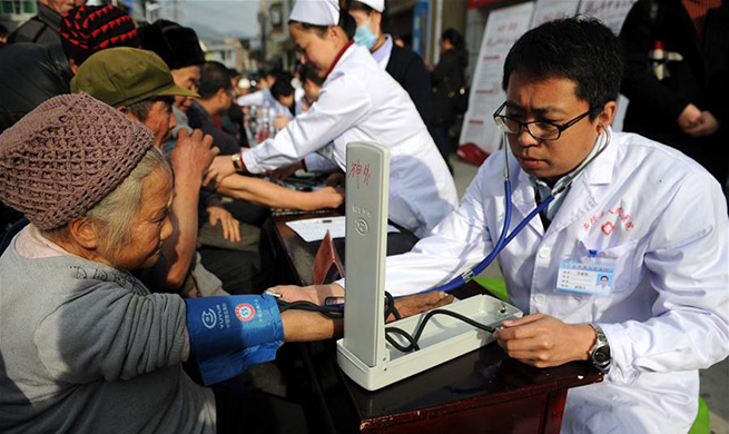 Villagers receive free health service in poverty-stricken areas in Guizhou