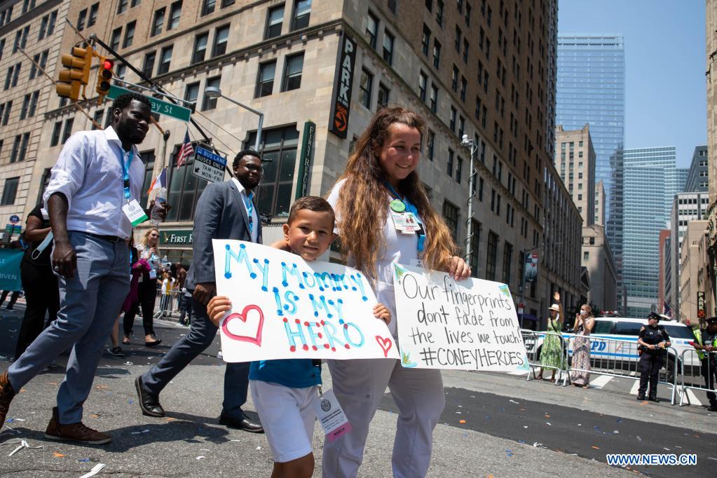 new york essential workers hold ticker tape parade