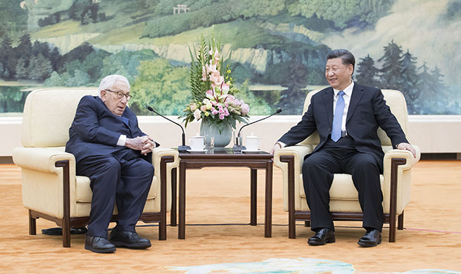 President Xi meets Kissinger