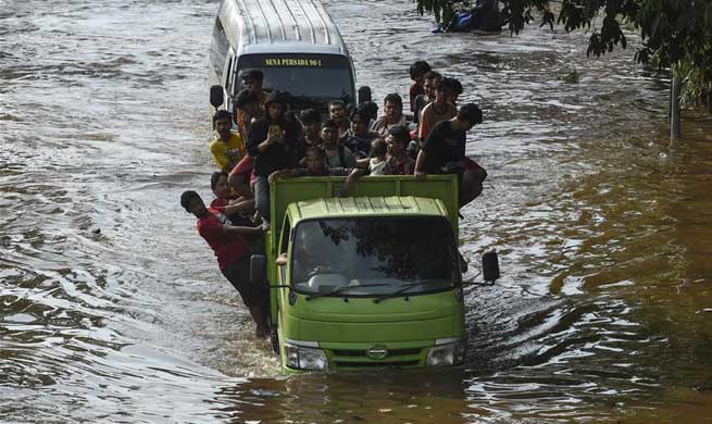 Flood waters submerge several parts of Jakarta, Indonesia