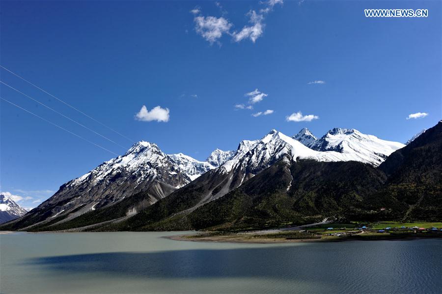 Photo taken on June 4, 2016 shows the scenery of Ranwu Lake in Basu County of Chamdo City, southwest China's Tibet Autonomous Region. 