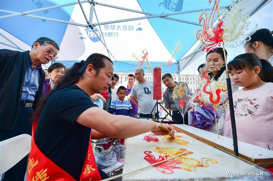 The exhibition was held to mark China's 11th Culture Heritage Day.