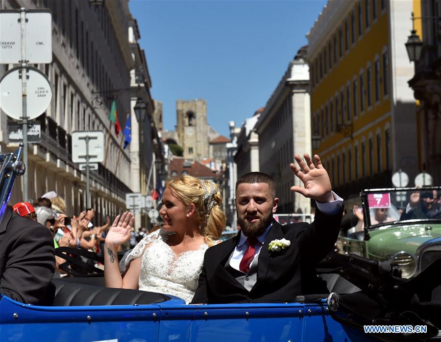 Newly-wed couples take part in a group-wedding in Lisbon, capital of Portugal, on June 12, 2016