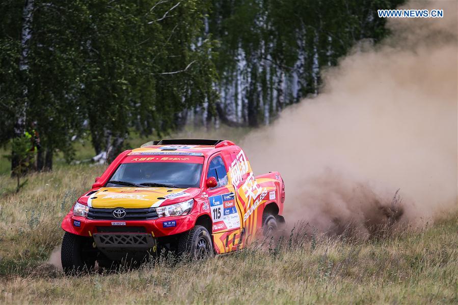 Zhou Yong and Xavier Panseri of Boundless Young Team compete during the third stage of the Moscow-Beijing Silk Road rally 2016 in Ufa, Russia on July 11, 2016. 