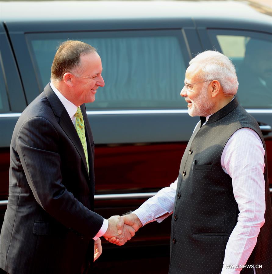 New Zealand's Prime Minister John Key arrived in Delhi Tuesday on a three-day tour of India after a one-day delay