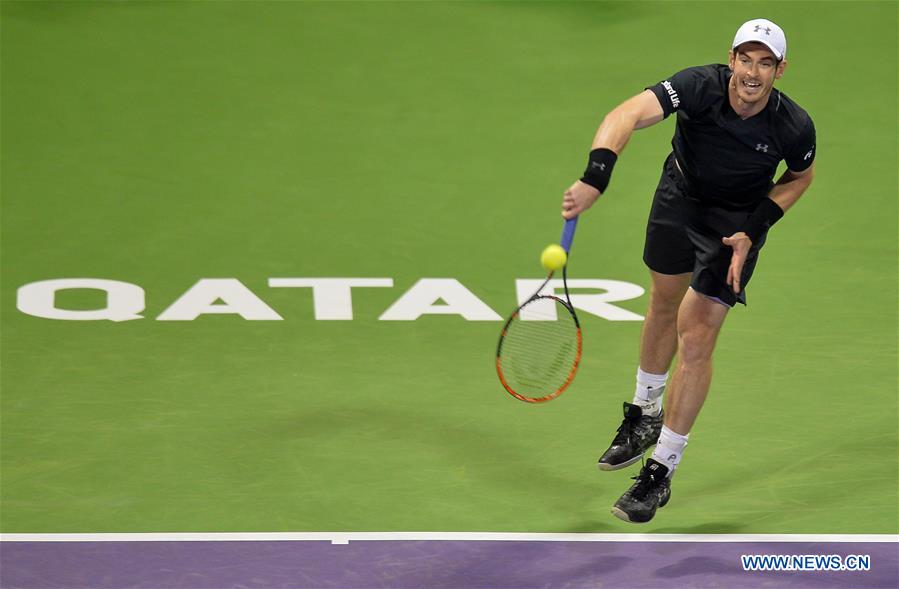 Andy Murray of Britain serves to Tomas Berdych of the Czech Republic during the men's singles semifinal of the ATP Qatar Open tennis tournament at the Khalifa International Tennis Complex in Doha, capital of Qatar, on Jan. 6, 2017. Andy Murray won 2-0.(Xinhua/Nikku)