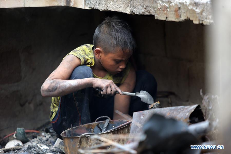 PHILIPPINES-MANILA-SLUM AREA FIRE-AFTERMATH