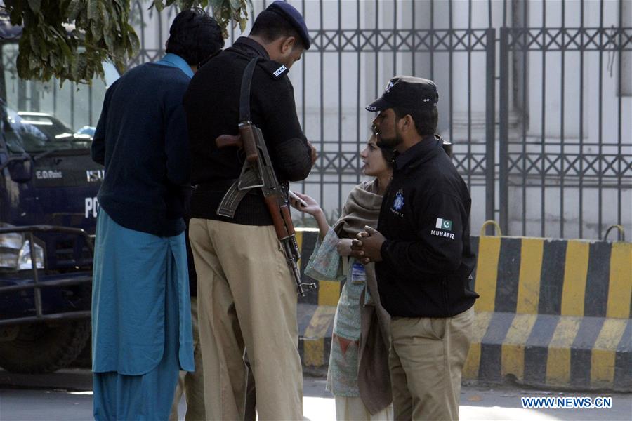 aftermath of suicide bombing in pakistan"s lahore