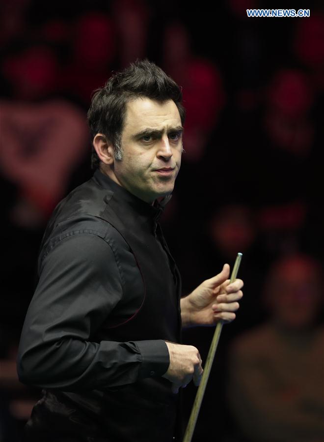 Ronnie O'Sullivan of England competes during his first round match with Tom Ford of England at Welsh Open 2017 in Cardiff, Wales, Britain on Feb. 14, 2017. 