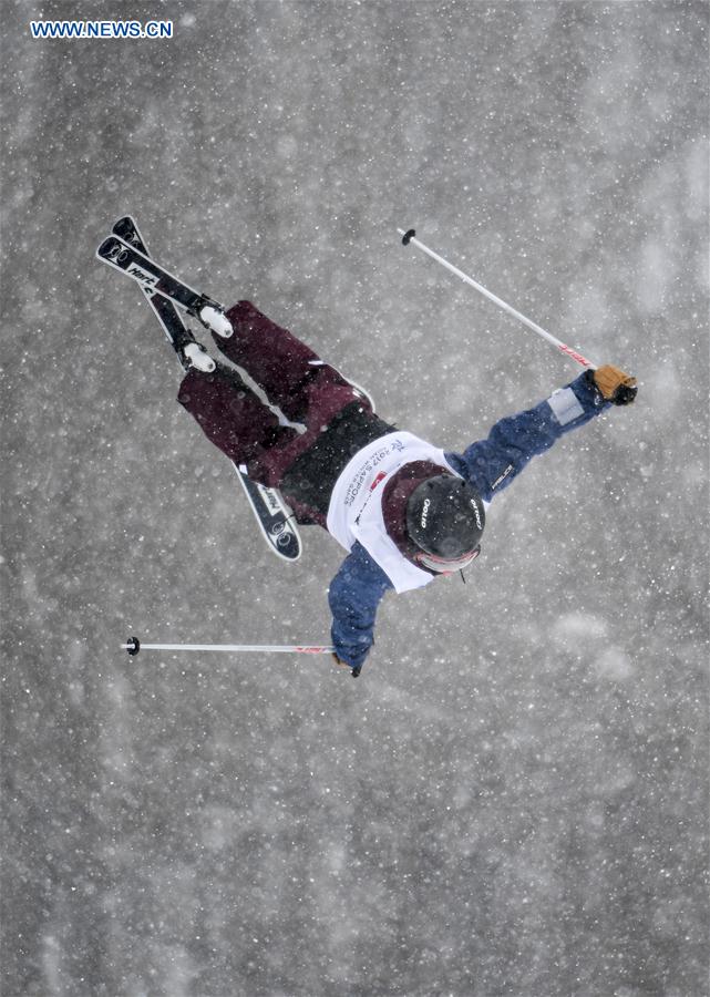 competes during the women"s dual moguls of freestyle skiing at