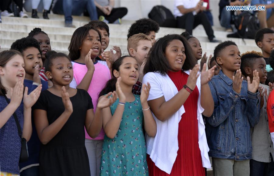 Students of Watkins Elementary School participate in the 13th annual reading of Martin Luther King's 'I Have a Dream' speech event at Lincoln Memorial in Washington D.C., capital of the United States, on Feb. 24, 2017 to commemorate the civil rights leader. 
