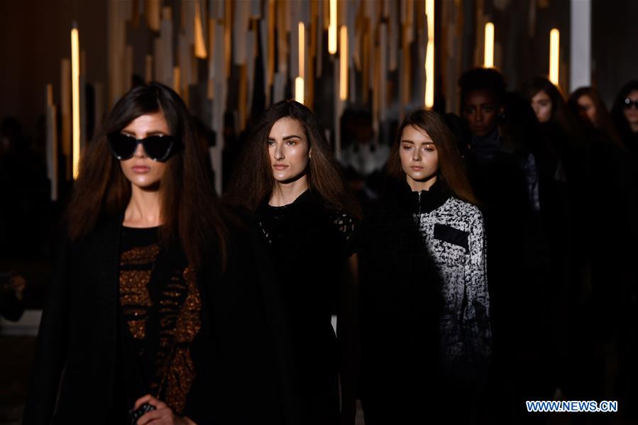 Models present creations of Luis Buchinho during the Women's Ready-to-Wear Fall Winter 2017/2018 fashion week in Paris, France, on March 1, 2017.