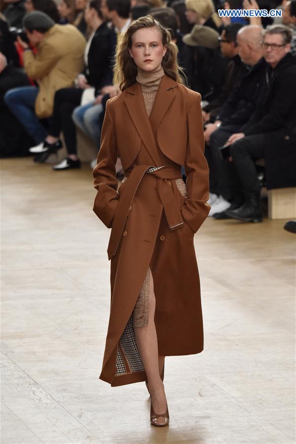 A model presents a creation of Nina Ricci during the Women's Ready-to-Wear Fall Winter 2017/2018 fashion week in Paris, France, on March 4, 2017. 