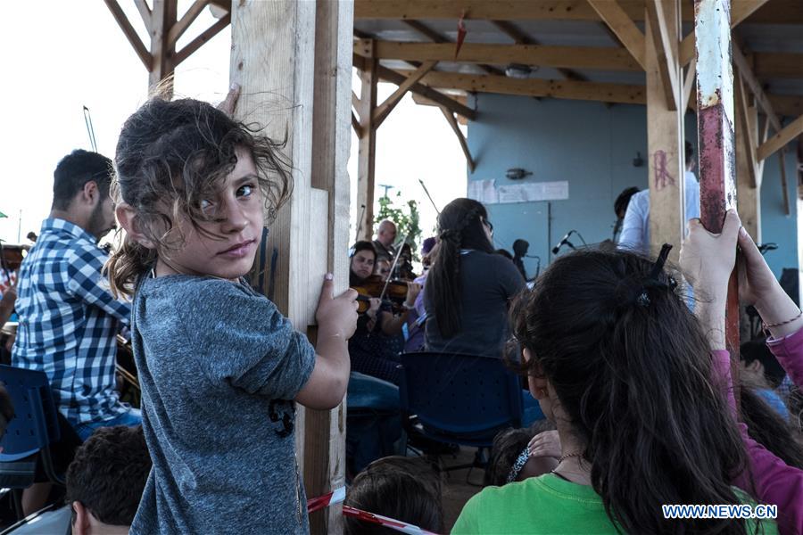 GREECE-PIRAEUS-SKARAMANGAS REFUGEE CAMP-MUNICIPAL YOUTH ORCHESTRA OF CARACAS-CONCERT