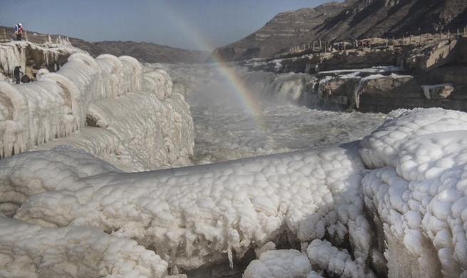 Rainbow, icicles seen on Hukou Waterfall scenic spot