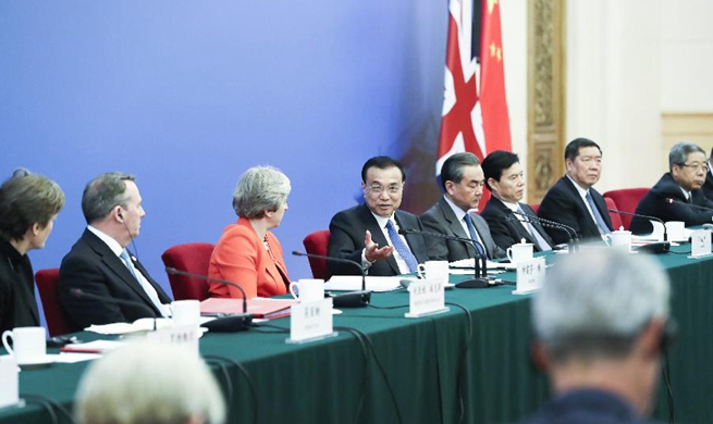 Chinese premier, visiting British PM meets representatives of entrepreneurs