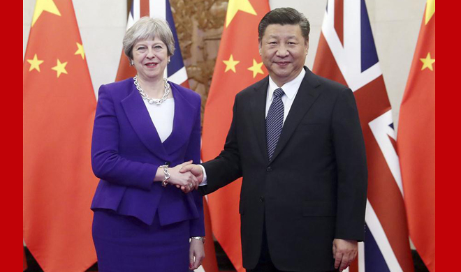 Xi meets May, calling for better Sino-British ties in new era