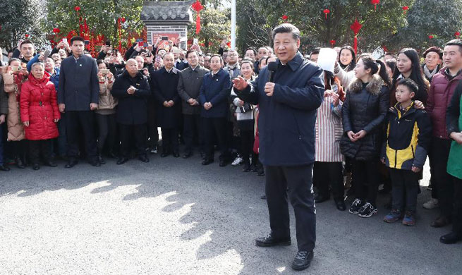 "My job is to serve the people," Xi says in Lunar New Year inspection
