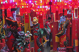 People light incense and pray before Chinese Lunar New Year in Jakarta