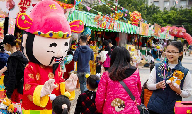 People do Spring Festival shopping in Macao for Chinese Lunar New Year