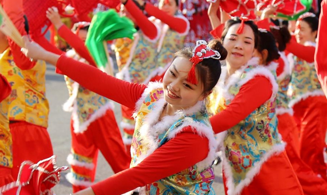 Dancers perform folk art to celebrate Chinese Lunar New Year
