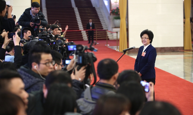 Ministers receive interview after second plenary meeting of first session of 13th NPC
