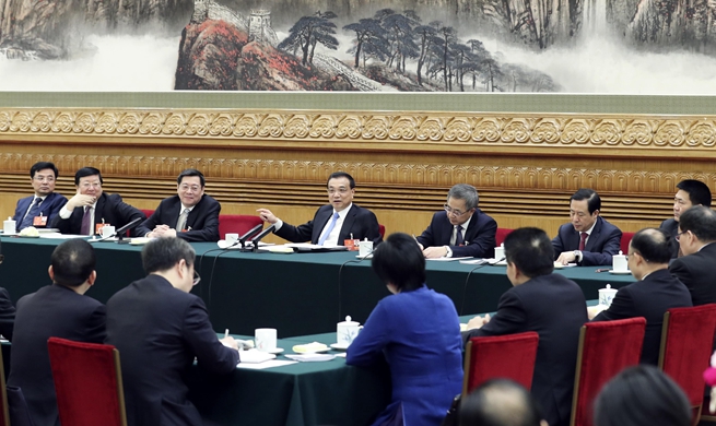 Chinese leaders join panel discussions at NPC session