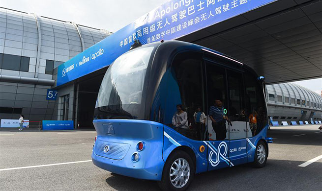 China's first driverless bus makes its debut ahead of Digital China Summit
