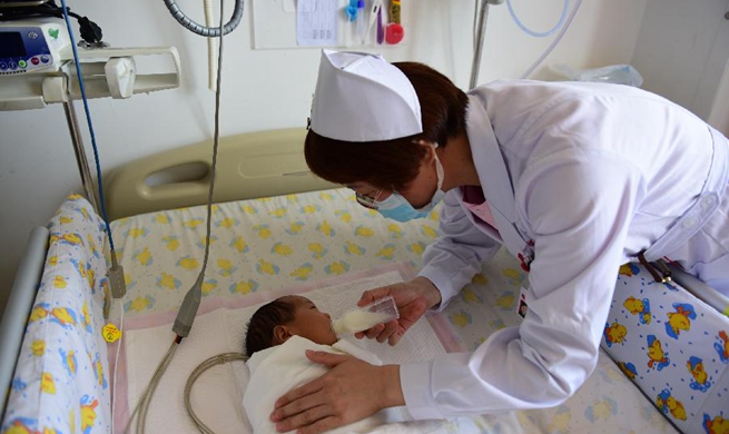 Nurses work ahead of International Nurses Day across China