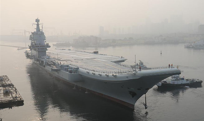 China's first domestically-built aircraft carrier sets out for sea trials