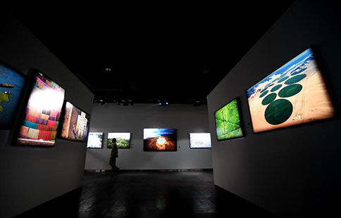 int"l photo exhibition opens in central china