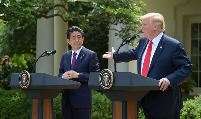Trump, Abe attend joint press briefing at White House