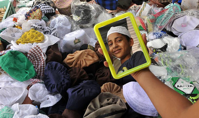 Muslims prepare for Eid al-Fitr festival across world