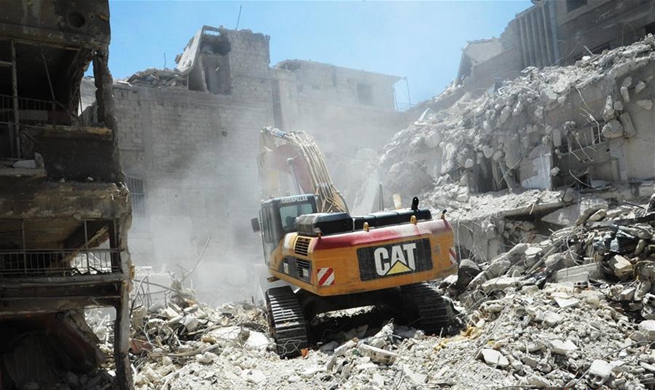 Syrian gov't starts demolishing largely-destroyed buildings in Harasta