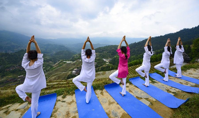 International Yoga Day marked in China