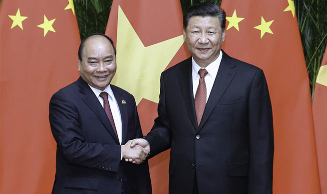 Xi meets Vietnamese prime minister