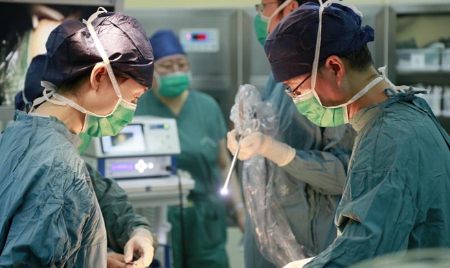 China Focus: China's first baby born from transplanted womb