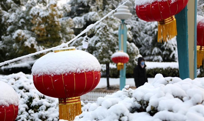 Parts of central, eastern China meet snow because of strong cold front