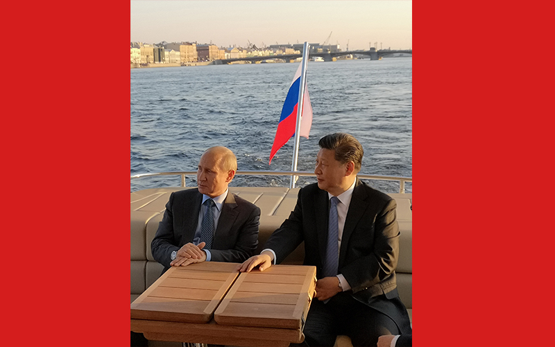 Xi, Putin meet in St. Petersburg
